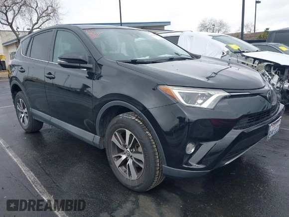 2018 Toyota RAV4 XLE with VIN 2T3WFREV3JW516867, listed as a IAAI auction lot 41765369 with 54,390 mi miles. Bid and sale history available at carsss.com. Image 1.
