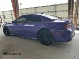 2019 Dodge Charger Scat Pack with VIN 2C3CDXGJ2KH633787, listed as a Copart auction lot 52279515 with 54,742 mi miles and Salvage Title. Bid and sale history available at DreamBid. Image 2.