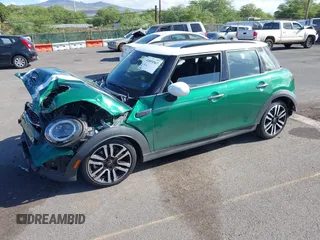 2022 MINI Hardtop 4 Door Cooper S z VIN WMW53DK0XN2R31678, wystawiony jako IAAI lot #41859367 z przebiegiem Nie podano mil oraz . Historia ofert i sprzedaży dostępna na DreamBid. Obrazek 2.