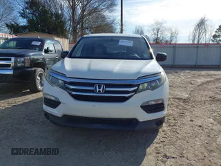 2016 Honda Pilot LX with VIN 5FNYF5H16GB033964, listed as a IAAI auction lot 41607930 with 168,137 mi miles and . Bid and sale history available at DreamBid. Image 12.