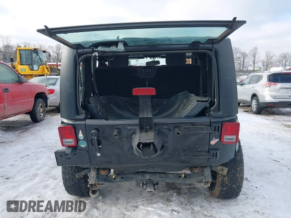 2013 Jeep Wrangler Rubicon 10th Anniversary with VIN 1C4BJWCG3DL591186, listed as a IAAI auction lot 41315969 with 54,984 mi miles and . Bid and sale history available at DreamBid. Image 17.