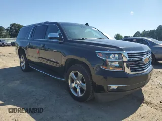 2017 Chevrolet Suburban Premier with VIN 1GNSCJKC6HR159570, listed as a Copart auction lot 55352805 with 166,661 mi miles and Salvage title. Bid and sale history available at DreamBid. Image 4.