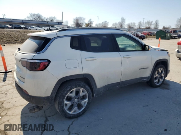 2021 Jeep Compass Limited with VIN 3C4NJDCB4MT556585, listed as a Copart auction lot 47428245 with 99,168 mi miles and Salvage Title. Bid and sale history available at DreamBid. Image 3.