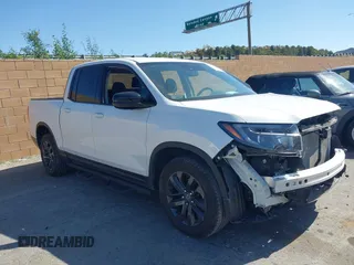 2023 Honda Ridgeline Sport z VIN 5FPYK3F13PB060341, wystawiony jako IAAI lot #41955592 z przebiegiem 27 927 mil mil oraz . Historia ofert i sprzedaży dostępna na DreamBid. Obrazek 1.