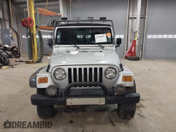 2003 Jeep Wrangler Rubicon with VIN 1J4FA69S13P375142, listed as a IAAI auction lot 41709647 with 125,443 mi miles and . Bid and sale history available at DreamBid. Image 13.
