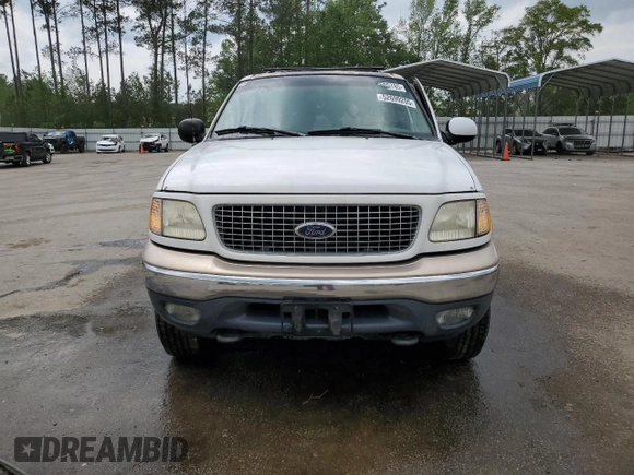 1999 Ford Expedition XLT z VIN 1FMPU18L0XLC10111, wystawiony jako Copart lot #52699205 z przebiegiem Nie podano mil oraz Szkoda całkowita • Salvage title. Historia ofert i sprzedaży dostępna na DreamBid. Obrazek 5.