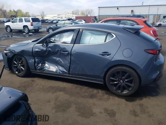 2021 Mazda 3 Premium Plus z VIN JM1BPBNY7M1311309, wystawiony jako Copart lot #54044315 z przebiegiem 59 642 mil mil oraz Szkoda całkowita • Salvage title. Historia ofert i sprzedaży dostępna na DreamBid. Obrazek 2.