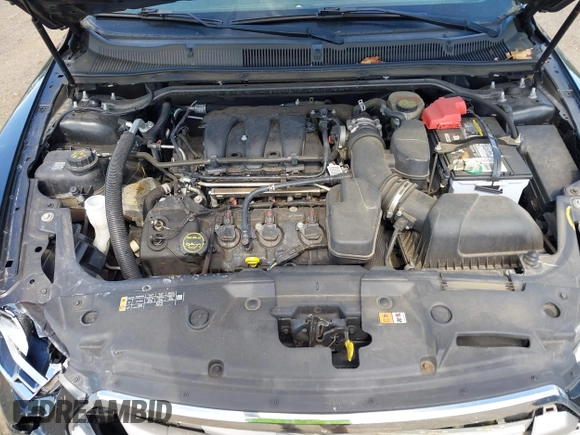 2015 Ford Taurus SEL with VIN 1FAHP2E88FG181055, listed as a IAAI auction lot 42307640 with 104,702 mi miles and . Bid and sale history available at DreamBid. Image 10.