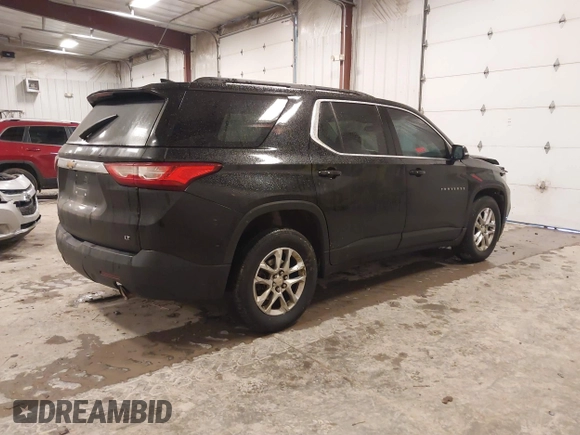 2019 Chevrolet Traverse LT Cloth with VIN 1GNERGKW2KJ129139, listed as a IAAI auction lot 41483057 with 219,032 mi miles. Bid and sale history available at carsss.com. Image 4.