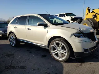 2014 Lincoln MKX z VIN 2LMDJ8JK0EBL14248, wystawiony jako Copart lot #49109075 z przebiegiem 149 317 mil mil oraz Szkoda całkowita • Salvage title. Historia ofert i sprzedaży dostępna na DreamBid. Obrazek 4.