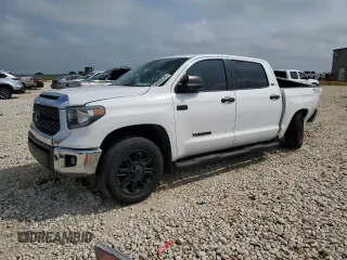 2021 Toyota Tundra SR5 with VIN 5TFEY5F16MX273095, listed as a Copart auction lot 54303515 with 103,993 mi miles and Salvage title. Bid and sale history available at DreamBid. Image 1.