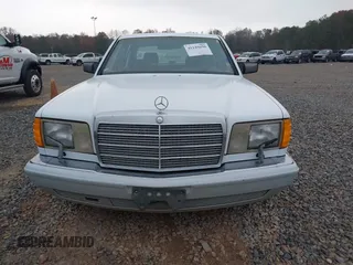 1989 Mercedes-Benz 420 Series 420SEL with VIN WDBCA35E4KA456613, listed as a IAAI auction lot 41145650 with 199,599 mi miles. Bid and sale history available at carsss.com. Image 12.