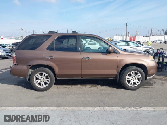 2004 Acura MDX Touring Pkg w/Navigation with VIN 2HNYD18854H511500, listed as a IAAI auction lot 41581417 with 223,757 mi miles. Bid and sale history available at carsss.com. Image 13.