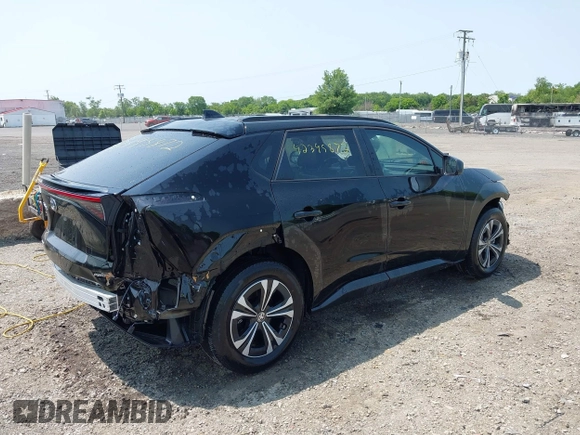 2024 Toyota bZ4X XLE with VIN JTMABACA7RA061457, listed as a IAAI auction lot 42395872 with 16,558 mi miles and . Bid and sale history available at DreamBid. Image 4.