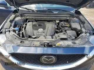 2021 Mazda CX-5 Grand Touring with VIN JM3KFBDM0M0500561, listed as a Copart auction lot 58214665 with 49,543 mi miles and Salvage title. Bid and sale history available at DreamBid. Image 12.