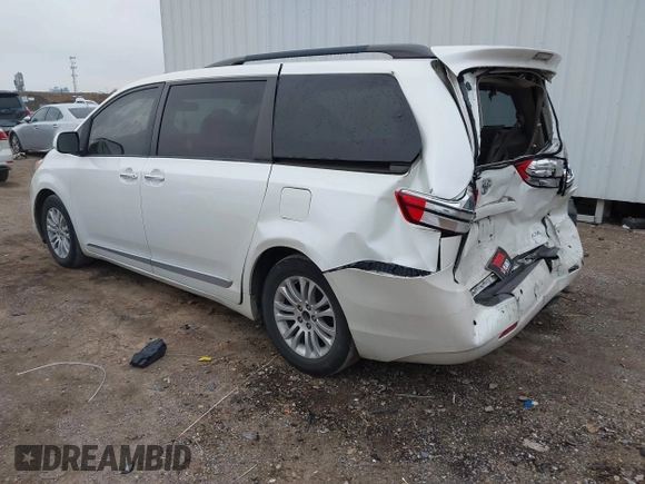 2016 Toyota Sienna XLE with VIN 5TDYK3DC2GS726677, listed as a IAAI auction lot 41609165 with 144,858 mi miles. Bid and sale history available at carsss.com. Image 3.