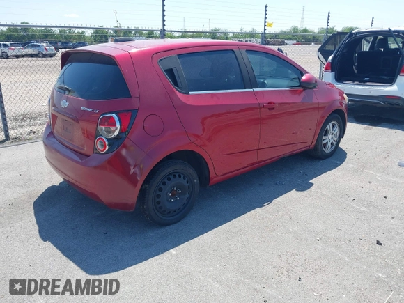 2016 Chevrolet Sonic LT with VIN 1G1JC6SH7G4127373, listed as a IAAI auction lot 41970423 with 130,440 mi miles. Bid and sale history available at carsss.com. Image 4.