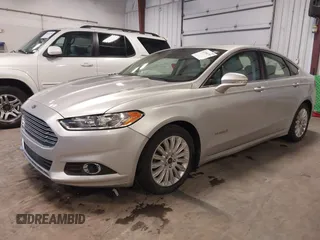 2015 Ford Fusion SE Hybrid with VIN 3FA6P0LU7FR266702, listed as a IAAI auction lot 41390791 with 94,465 mi miles. Bid and sale history available at carsss.com. Image 2.