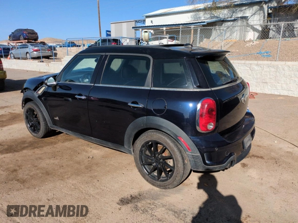 2012 MINI Countryman S with VIN WMWZC5C50CWL63321, listed as a Copart auction lot 52427065 with 126,898 mi miles and Salvage Title. Bid and sale history available at DreamBid. Image 2.
