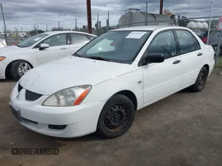 2004 Mitsubishi Lancer ES with VIN JA3AJ26E74U060371, listed as a IAAI auction lot 41636927 with 165,456 mi miles. Bid and sale history available at carsss.com. Image 2.