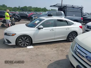 2022 Honda Civic EX with VIN JHMFE1F78NX004526, listed as a IAAI auction lot 42430668 with 56,246 mi miles and . Bid and sale history available at DreamBid. Image 14.