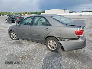 2005 Toyota Camry LE with VIN 4T1BF32K45U599214, listed as a Copart auction lot 52609295 with 304,316 mi miles and Salvage Title. Bid and sale history available at DreamBid. Image 2.