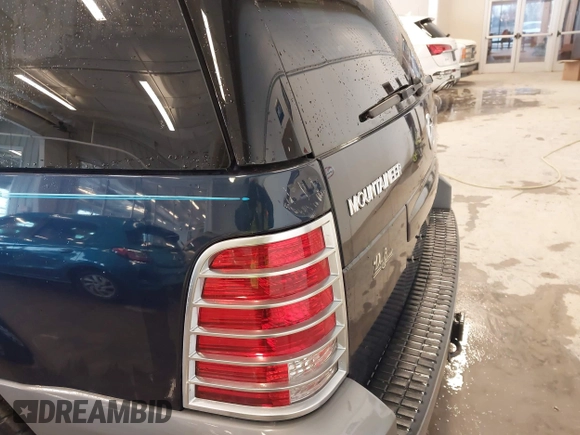 2003 Mercury Mountaineer Convenience z VIN 4M2ZU86W03UJ16828, wystawiony jako IAAI lot #41580919 z przebiegiem 148 968 mil mil oraz . Historia ofert i sprzedaży dostępna na DreamBid. Obrazek 19.