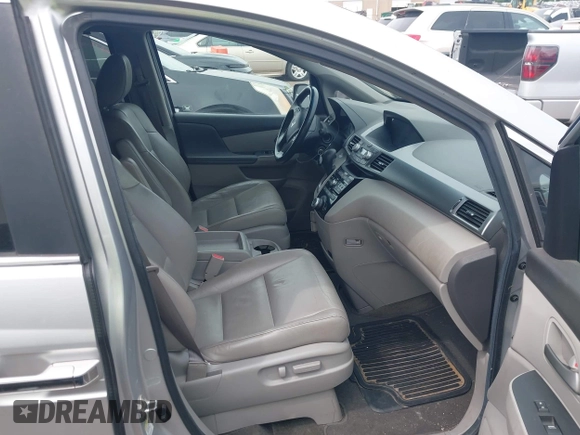 2012 Honda Odyssey EX-L with VIN 5FNRL5H66CB081323, listed as a IAAI auction lot 42465110 with 266,934 mi miles and . Bid and sale history available at DreamBid. Image 5.