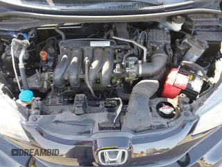 2015 Honda Fit LX with VIN 3HGGK5G5XFM737172, listed as a IAAI auction lot 42053332 with 80,690 mi miles and . Bid and sale history available at carsss.com. Image 10.