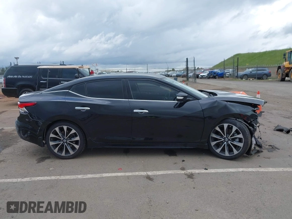 2016 Nissan Maxima SV z VIN 1N4AA6AP8GC408857, wystawiony jako IAAI lot #41892425 z przebiegiem 185 487 mil mil oraz . Historia ofert i sprzedaży dostępna na DreamBid. Obrazek 14.