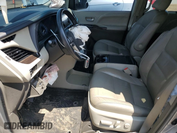 2017 Toyota Sienna XLE with VIN 5TDDZ3DC3HS177700, listed as a Copart auction lot 59720215 with 124,180 mi miles and Salvage title. Bid and sale history available at DreamBid. Image 7.