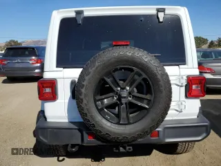 2022 Jeep Wrangler Unlimited Sahara Altitude with VIN 1C4HJXEG1NW235753, listed as a Copart auction lot 75942634 with 16,771 mi miles and Salvage title. Bid and sale history available at DreamBid. Image 6.
