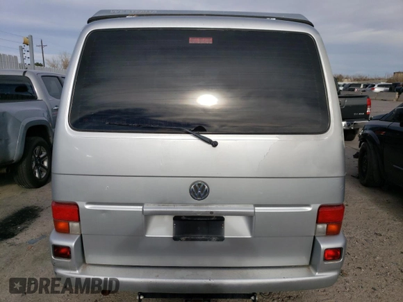 2002 Volkswagen EuroVan MV с VIN WV2NB47052H015757, выставлен на аукционе Copart как лот 81666434 с пробегом 191 543 миль миль и Чистый • Clean title. История ставок и продаж доступна на DreamBid. Изображение 6.