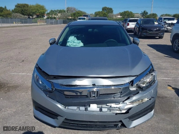 2017 Honda Civic Sedan LX with VIN 19XFC2F52HE038428, listed as a IAAI auction lot 41781577 with 72,730 mi miles. Bid and sale history available at carsss.com. Image 6.