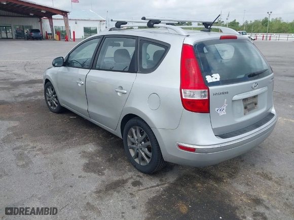 2012 Hyundai Elantra Touring SE with VIN KMHDC8AE0CU130029, listed as a IAAI auction lot 41918117 with 171,555 mi miles. Bid and sale history available at carsss.com. Image 3.