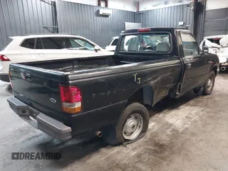 1995 Ford Ranger Splash z VIN 1FTCR10A7STA63518, wystawiony jako IAAI lot #42098095 z przebiegiem 75 409 mil mil oraz . Historia ofert i sprzedaży dostępna na DreamBid. Obrazek 4.