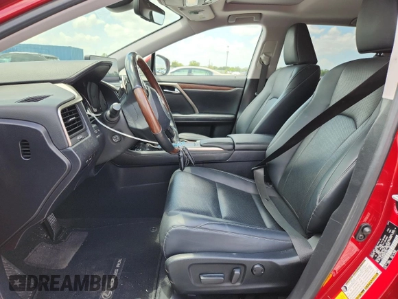 2021 Lexus RX 350L with VIN JTJHZKEA6M2018970, listed as a Copart auction lot 58027705 with 65,070 mi miles and Salvage title. Bid and sale history available at DreamBid. Image 7.