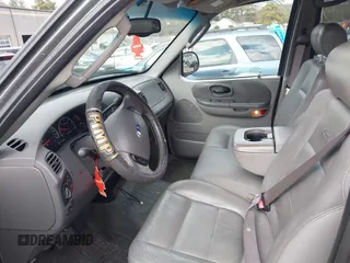 2003 Ford F-150 XLT with VIN 1FTRW08L63KA37275, listed as a IAAI auction lot 41875128 with 133,257 mi miles. Bid and sale history available at carsss.com. Image 5.