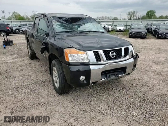 2012 Nissan Titan SV z VIN 1N6AA0EC0CN311288, wystawiony jako Copart lot #56845405 z przebiegiem 71 180 mil mil oraz Szkoda całkowita • Salvage title. Historia ofert i sprzedaży dostępna na DreamBid. Obrazek 14.