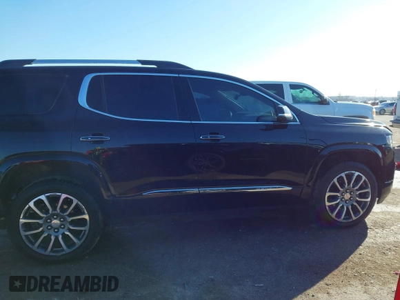 2021 GMC Acadia Denali z VIN 1GKKNXLS1MZ201458, wystawiony jako IAAI lot #41133634 z przebiegiem 46 568 mil mil oraz . Historia ofert i sprzedaży dostępna na DreamBid. Obrazek 13.