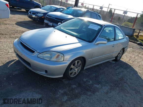 1999 Honda Civic DX with VIN 1HGEJ6120XL034343, listed as a IAAI auction lot 41691134 with 21,882 mi miles. Bid and sale history available at carsss.com. Image 2.