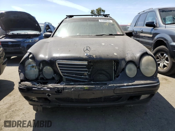 2001 Mercedes-Benz E-Class AWD with VIN WDBJH82J71X051634, listed as a Copart auction lot 51299544 with 286,211 mi miles and Salvage Title. Bid and sale history available at carsss.com. Image 5.