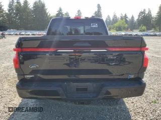 2023 Ford F-150 Lightning Pro with VIN 1FTVW1EV5PWG63666, listed as a Copart auction lot 60998415 with 35,089 mi miles and Salvage title. Bid and sale history available at DreamBid. Image 6.