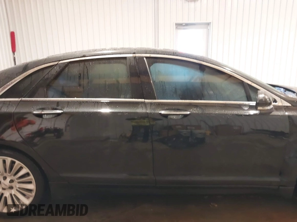 2014 Lincoln MKZ with VIN 3LN6L2G93ER800523, listed as a IAAI auction lot 41296957 with 140,136 mi miles. Bid and sale history available at carsss.com. Image 13.