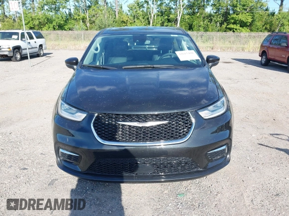2023 Chrysler Pacifica Touring L with VIN 2C4RC1BG1PR606566, listed as a IAAI auction lot 42615498 with 42,980 mi miles and . Bid and sale history available at DreamBid. Image 12.