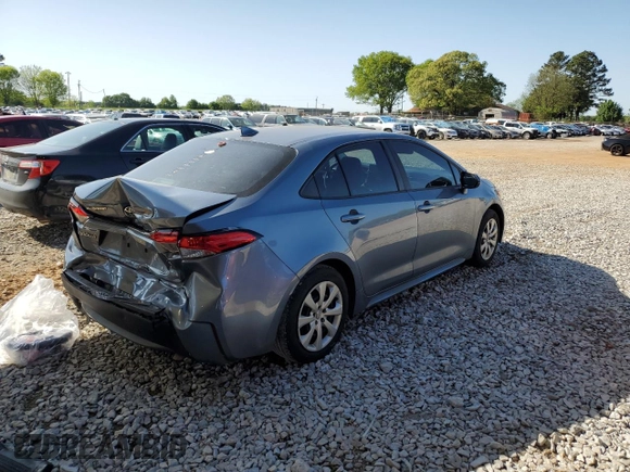 2021 Toyota Corolla LE with VIN 5YFEPMAE0MP150947, listed as a Copart auction lot 52053385 with 76,713 mi miles and Salvage Title. Bid and sale history available at DreamBid. Image 3.