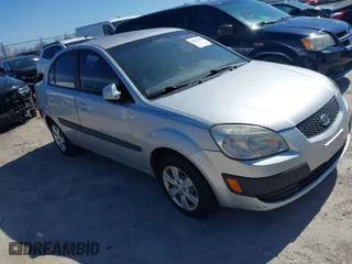 2008 Kia Rio LX with VIN KNADE123X86329097, listed as a IAAI auction lot 41822420 with 180,462 mi miles. Bid and sale history available at carsss.com. Image 1.