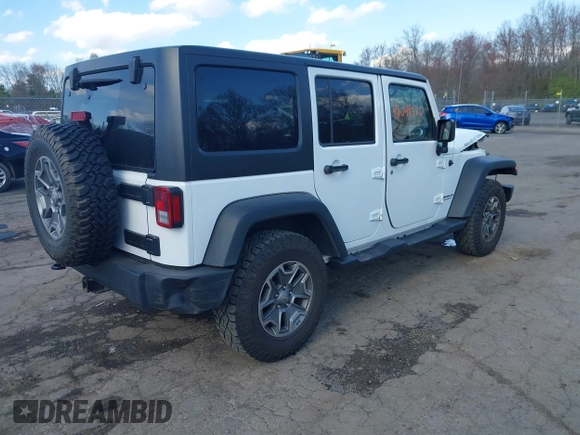 2015 Jeep Wrangler Unlimited Rubicon with VIN 1C4BJWFGXFL507315, listed as a IAAI auction lot 42059720 with 90,189 mi miles and . Bid and sale history available at DreamBid. Image 4.