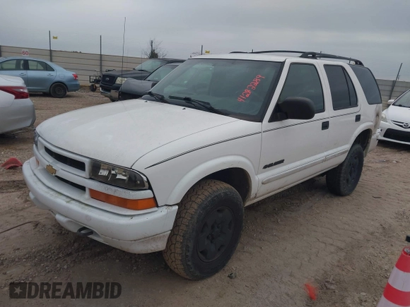 2004 Chevrolet Blazer LS z VIN 1GNDT13X34K157711, wystawiony jako IAAI lot #41282289 z przebiegiem 148 013 mil mil oraz . Historia ofert i sprzedaży dostępna na DreamBid. Obrazek 2.