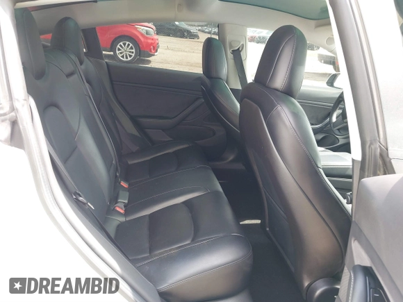 2019 Tesla Model 3 Mid Range with VIN 5YJ3E1EA8KF472540, listed as a IAAI auction lot 41661312 with 75,575 mi miles and . Bid and sale history available at DreamBid. Image 8.